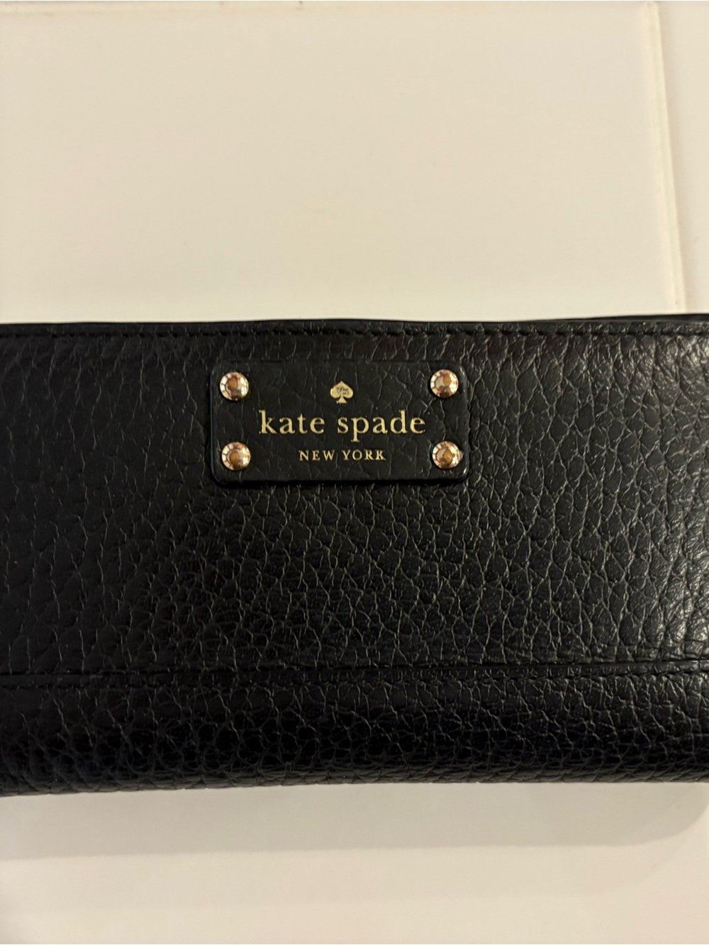 Kate Spade Black Pebbled Leather Wallet with Gold Plaque